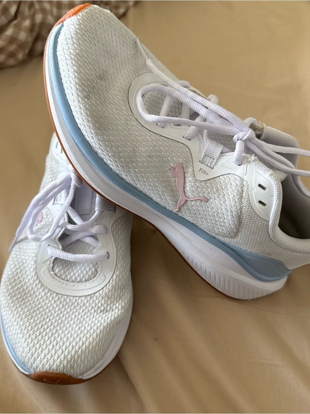 Puma Women's White Running Shoes with Pink Logo and Blue Trim